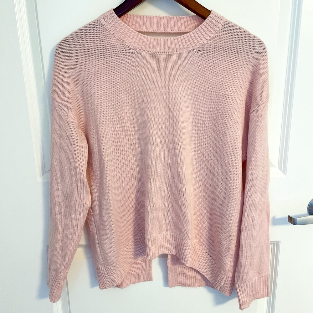 Revolve About Us pink open back sweater